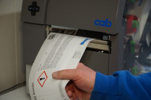 CAB label printer in use at Blaser Swisslube